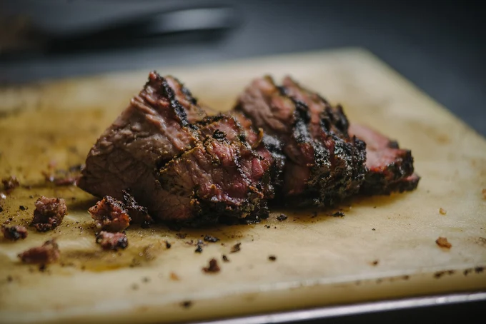 Sliced smoked brisket BBQ on a cutting board